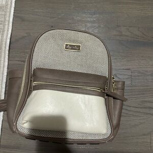 Brown and Cream Backpack with Gold Accents